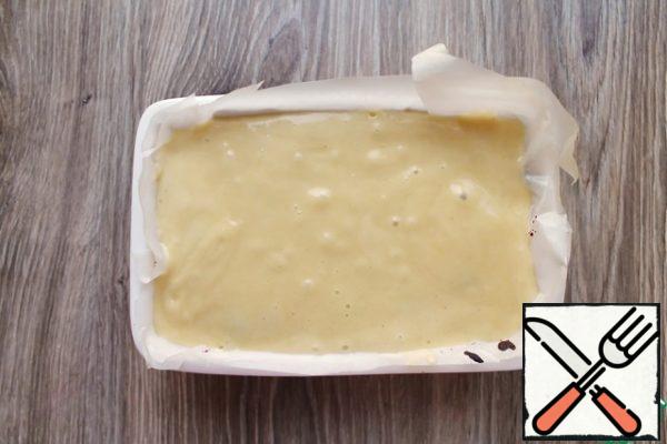Fill the top of the jam with the remaining dough and gently smooth it out.