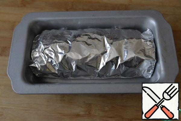 Wrap the roll in foil. Put on a baking sheet or in a convenient form.
Put in a heated oven to 200 degrees, bake for 1 hour.