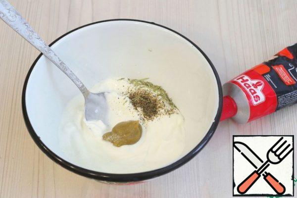 In a bowl, add sour cream (4 tablespoons), add mustard, add dried rosemary (1/2 teaspoon), add salt and ground white pepper, add 3 tablespoons of water. Stir the mixture.