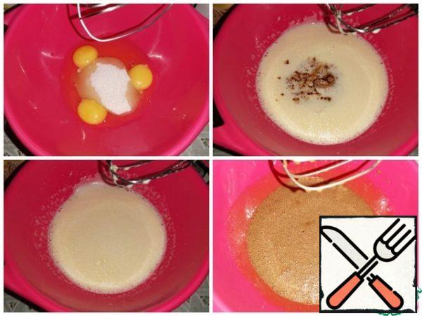 Beat the eggs with sugar, salt and vanilla sugar until white. Pour in the cooled Chocolate-butter mixture. Beat until smooth.