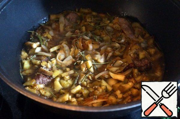 Add a little water or broth, add salt, smooth the sauce so that it evenly covers the meat.