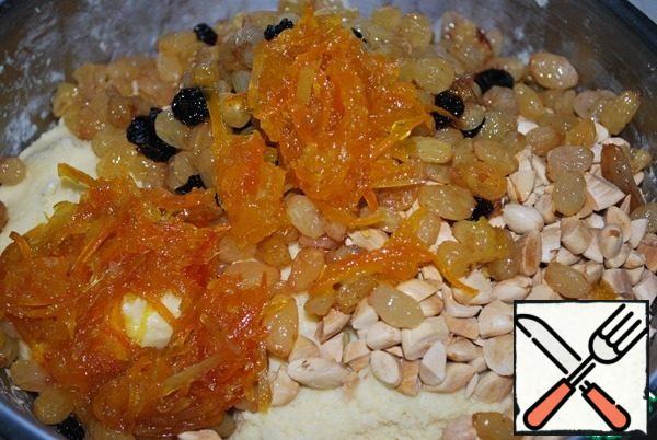 Add candied fruits and chopped almonds.