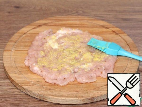 Grease the tortillas with mustard.