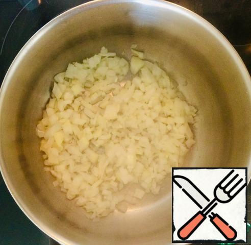 Fry finely chopped onion in vegetable oil (I have refined olive oil)