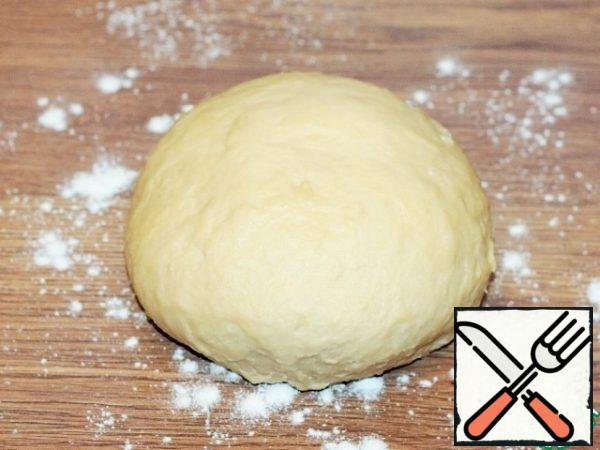We collect the dough in a lump.
