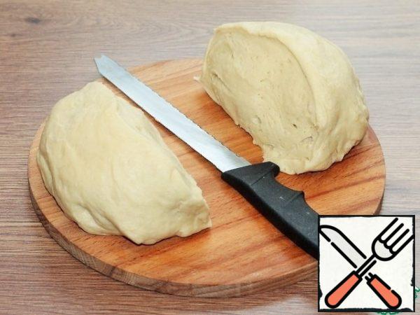 Divide the dough into two equal parts.