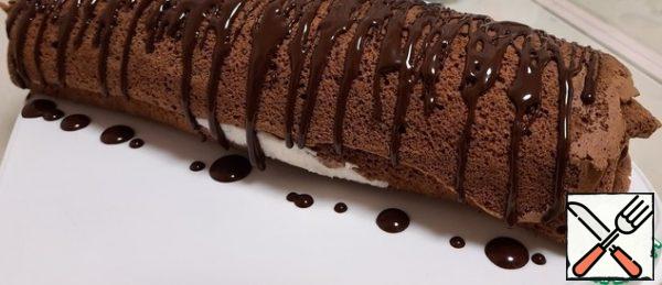 For decoration, you can melt 50 grams of chocolate with a tablespoon of vegetable oil and apply an even layer on top, or make any drawing.