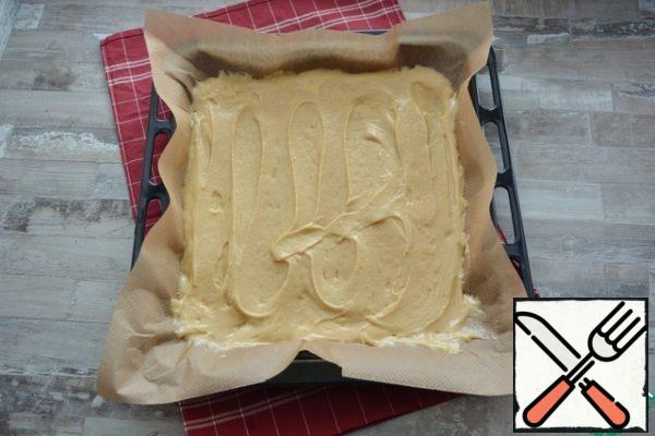 Cover the baking sheet with parchment, pour out the dough, spread it over the entire surface and put it in the oven. My baking tray 30*40 cm

Bake at t=180°C until tender (check with a toothpick).