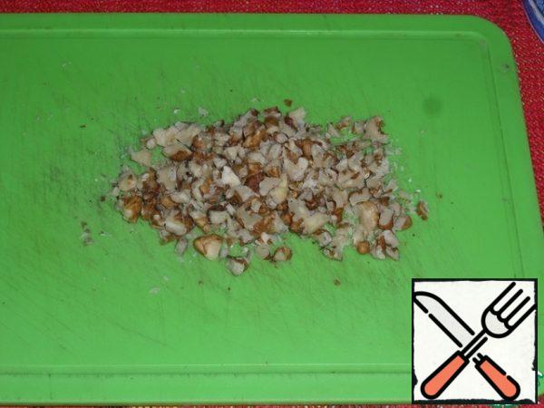 Lightly dry the nuts in the oven. Cool and grind.