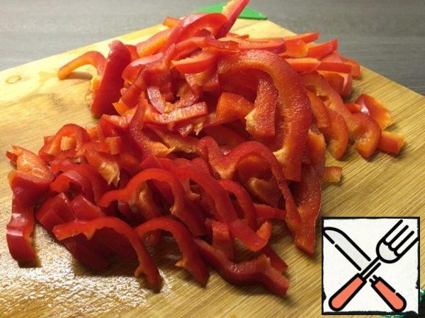 Chop the pepper.