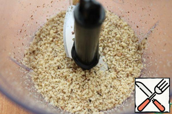 Chop the nuts in a blender.