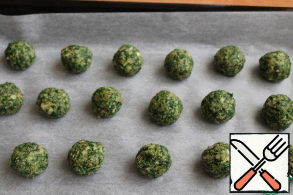 We line the baking sheet with parchment, form balls and spread them out. Bake at 180 degrees for 20 minutes.