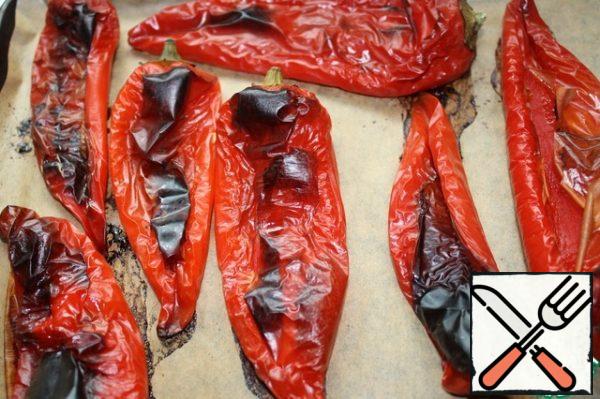 bake the peppers on the grill or in a very hot oven at 200 degrees for about 30 minutes, until the peel turns black.