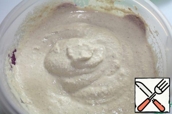 Fry the nuts in a frying pan or in the microwave. Chop the garlic.
Put everything in a blender, add a little water and grind into the sauce. If it is thick, then add water to make the sauce.