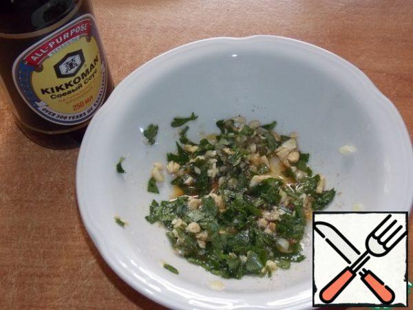 Add soy sauce and vegetable oil. A pinch of salt and sugar and black pepper to taste. Mix well.