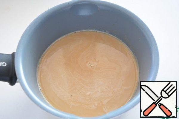 Add milk to the coffee.