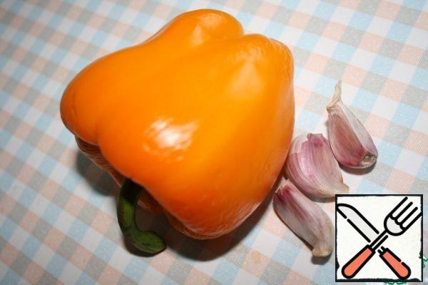 Preheat the oven to 200 * C and bake the pepper and garlic.
We bake the garlic for about 10 minutes and take it out,
and bake the pepper for 30 minutes,
then put it in a bag so that it sweats and the skin is easily removed.