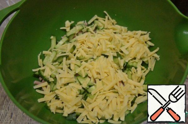 Then grated cheese on a large grater.