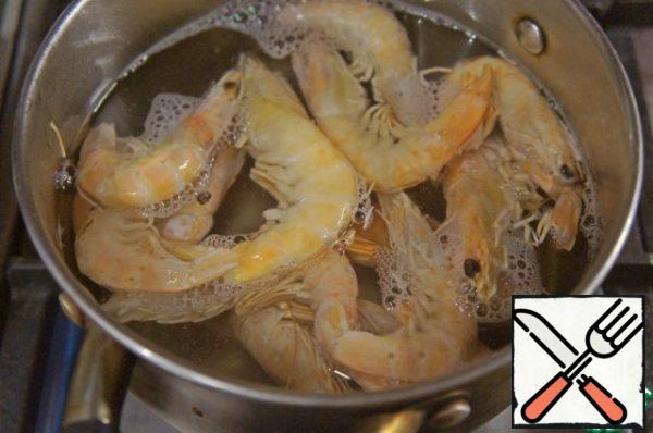 Shrimps are cooked-frozen, so you do not need to cook them. Just pour salted boiling water for a couple of minutes, then pour cold water over it.