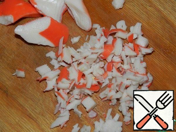 Crab sticks (meat) cut into small cubes.