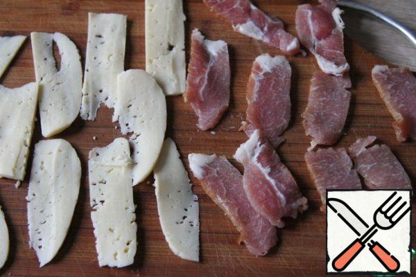 Hard cheese and neck cut into slices.