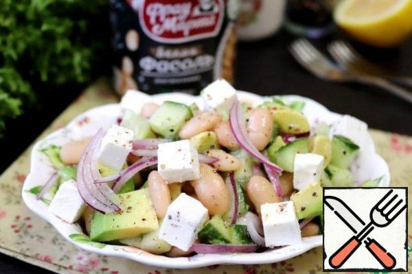 When serving, sprinkle the salad with cheese cubes.
The salad is ready.