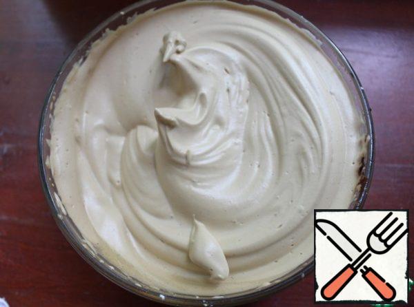 After 2-3 minutes, the mixture becomes lighter and becomes a soft brown color. Beat until peaks form.