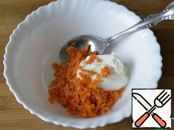 Korean carrots are cut and mixed with cottage cheese.