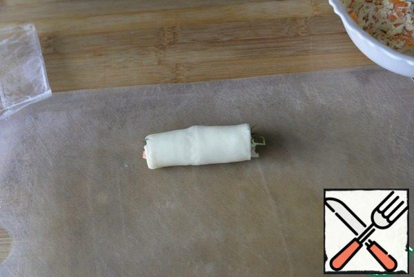 Roll the cheese into a roll.