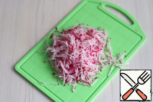 Grate the radish on a grater for Korean salads with a small section.