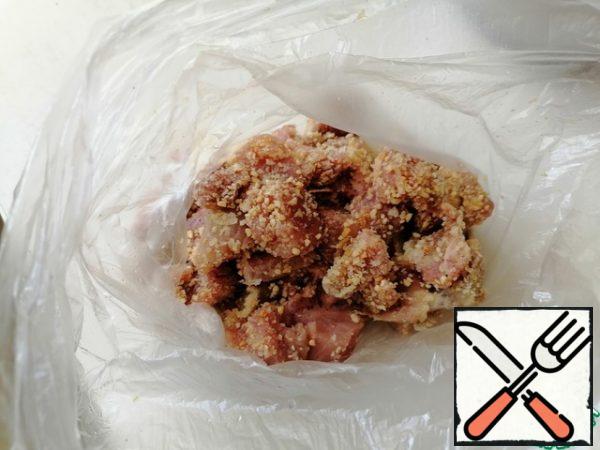 Season with salt and pepper. I still had the ground peanuts in which I had rolled the turkey slices. This is optional. Fry the turkey in oil for about 10 minutes.