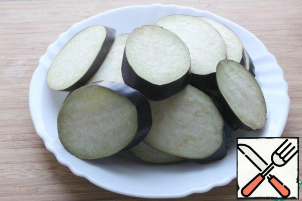 Eggplant cut into rings not very thinly.