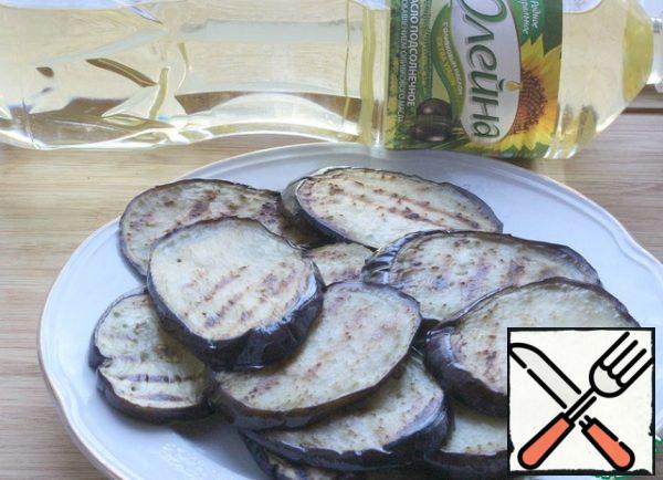 Add the fried eggplants to a platter and cool slightly.