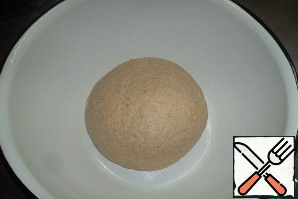 Knead the dough. Oil can be added immediately, but this is not good! Usually I do this - I start kneading with a spoon, and then just pour the oil a little bit on my hand and gradually mix it into the dough... Knead until "smooth". Minutes 10 ... 12. Please note-with such a degree of hydration of our flour, the dough will still stick to your hands. And to the table. Another point: kneading the dough on ice water requires physical effort. At the very beginning, you will probably think that the dough is "oak". Do not rush to conclusions - finish it to the end. Also, with manual kneading, it is unlikely that you will be able to knead the dough to the same state as in the dough mixer. Don't bother! 10 minutes by hand-enough for 2, 3 pizzas. If you will knead in the car-I can tell you the time only for the spiral dough mixer. 18 minutes. In general, for machine kneading, there are a couple of indicators of dough readiness: the dough begins to "click"at the end of the kneading. Air bubbles burst and it turns out such a shooting sound. The dough should not spread out on the bowl or bowl of the machine, but should be collected in a lump around the working mechanism. A few words about flour: although we have it all weak, but a small +\- still there. If you decide to prepare the dough according to these recipes-I advise you to do it clearly for the first time according to the layout. It will not be hard in any case, and if it turns out to be too soft-sticky - reduce the next time by 3...4 percent of water.