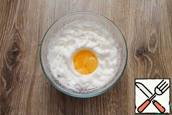 Separate the whites and yolks. Add a pinch of salt to the whites and whisk until thick peaks form. Continuing to beat, add the yolks and whisk for another 1-2 minutes.