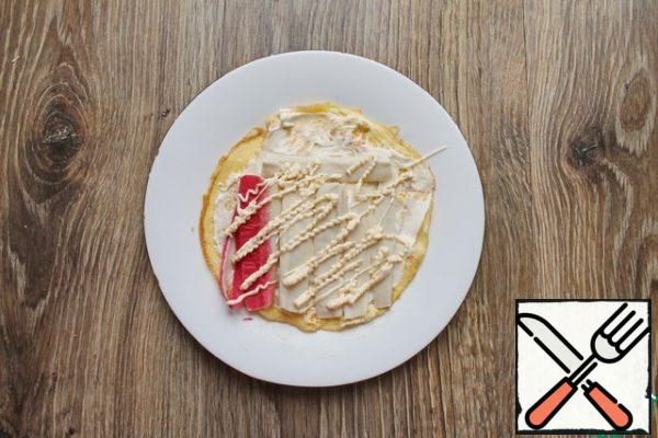 Apply a little mayonnaise to the sticks.