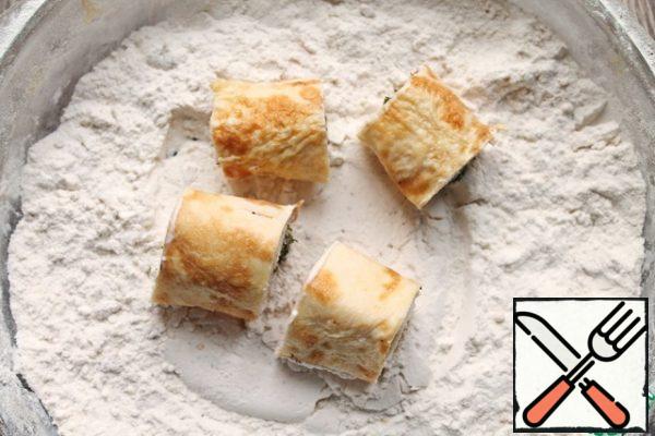 Roll them in flour.