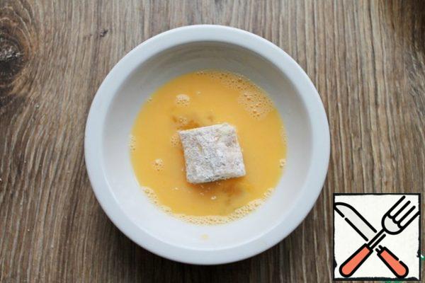 Stir the egg until smooth. Dip the pieces completely into it.