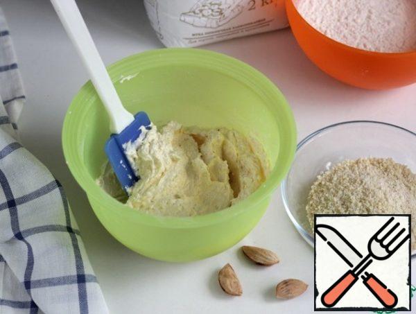 Add the ground nuts, mix on low speed mixer.