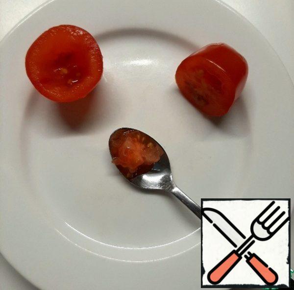 Cut the cherry tomatoes and remove the core with a teaspoon.