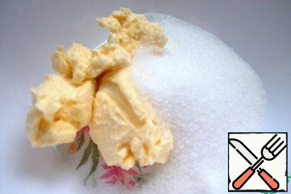 Combine soft butter with sugar.