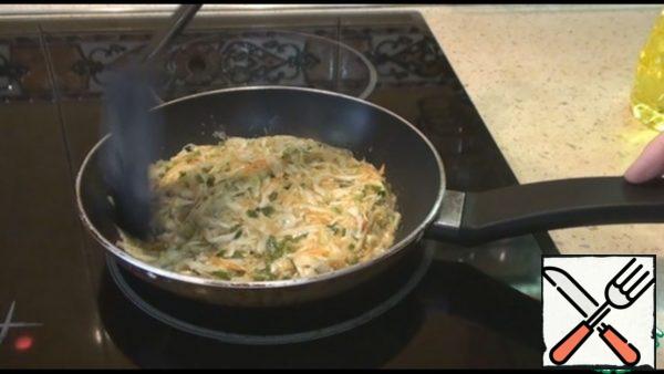 Put half of the dough on a preheated frying pan, tamp it a little. Fry on low heat for 5 minutes.