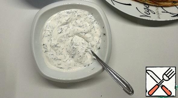 Washed and dried dill finely chopped and mixed with half of the curd cheese. Spread some of the pancakes.