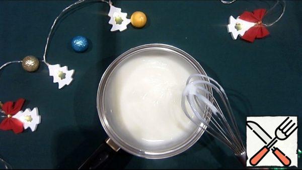 Preparing the filling.
Sugar, starch and vanilla fill with milk. Stirring, heat over low heat until thickened. Then add the coconut chips. Cover with plastic wrap and remove to the side.