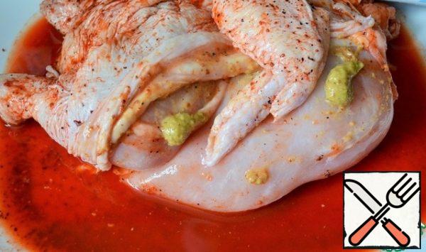 Before frying, pull off the skin and smear the chicken with mustard.