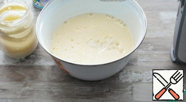 Add the condensed milk and mayonnaise, whisk again.