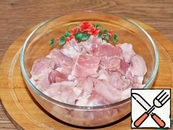 Grind pieces of meat in a meat grinder or blender.