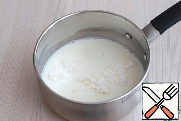 For filling cream:Add milk (250 ml) to a saucepan, then add 2 tbsp. spoons of starch. Stir the mixture until smooth. Put the saucepan over medium heat and, with constant stirring, thicken the milk-starch mixture.
