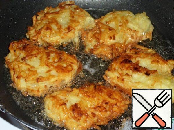 Fry on both sides until golden brown.
