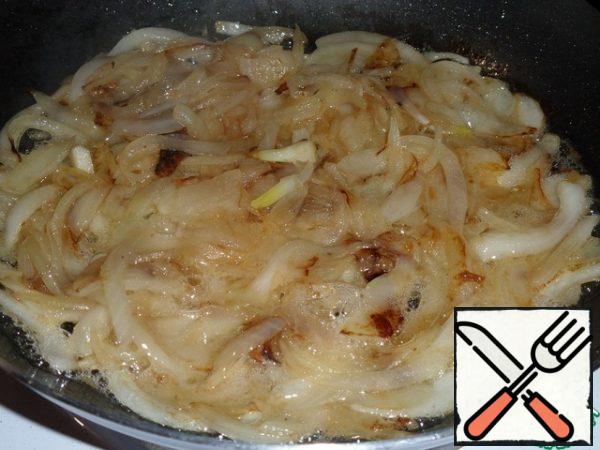 Fry until golden brown. Add a pinch of sugar, stir and remove from heat.